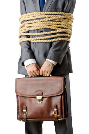 Businessman tied up on whiteの写真素材