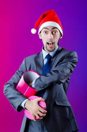 Drunken businessman after office christmas partyの写真素材