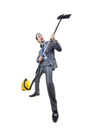 Businessman with vacuum cleaner on whiteの写真素材