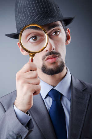 Detective and magnifying glassの写真素材