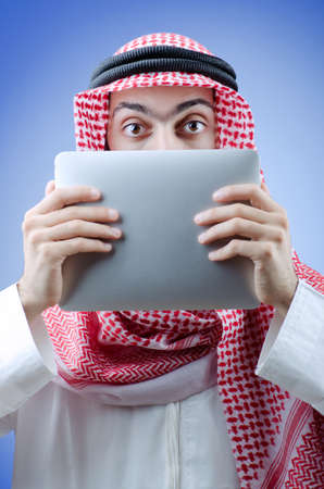 Young arab with tablet computerの写真素材