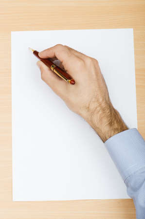 Hand writing a letterの写真素材