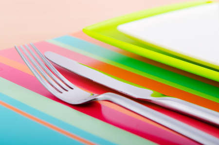 Empty plate with utensilsの写真素材