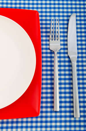 Empty plate with utensilsの写真素材