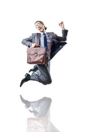 Businessman jumping on whiteの写真素材