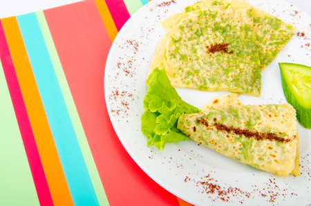 Pancake with herbs in the plateの写真素材