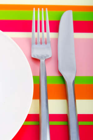 Empty plate with utensilsの写真素材