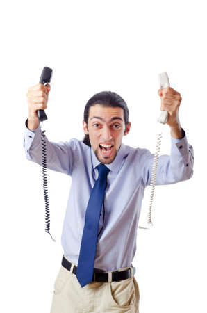 Angry businessman on the phoneの写真素材