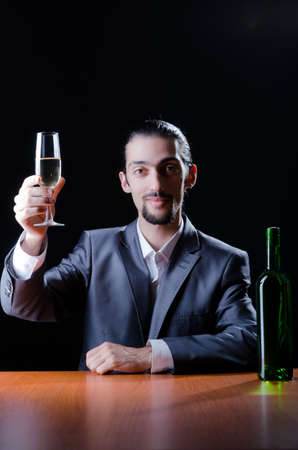 Man tasting wine in glassの写真素材