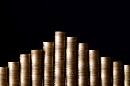 Golden coins in high stacks