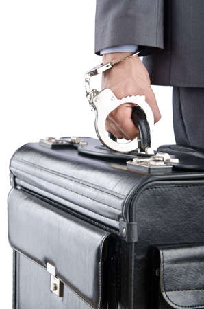 Man with briefcase and handcuffsの写真素材