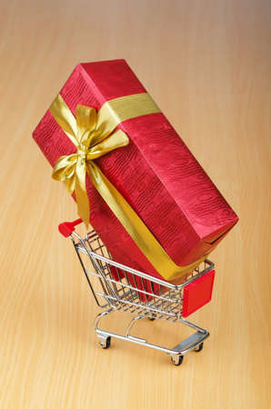 Christmas shopping concept with shopping cartの写真素材