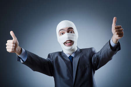 Man covered in medical bandagesの写真素材