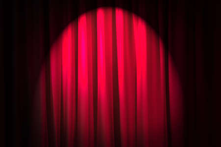 Brightly lit curtains in theatre conceptの写真素材
