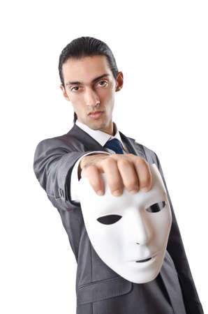 Industrial espionage concept with masked businessmanの写真素材