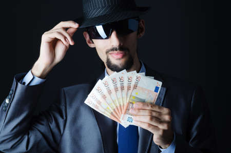 Man with counterfeir money