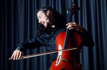 Cello player during performanceの写真素材