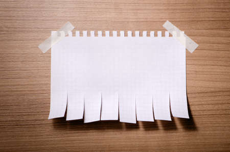 Tear off paper notice on the wallの写真素材
