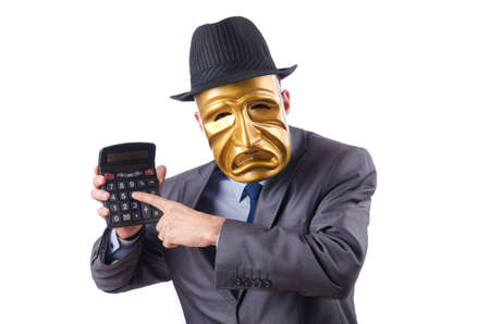 Masked man with calculator on whiteの写真素材