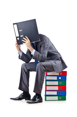 Young businessman with folders on whiteの写真素材