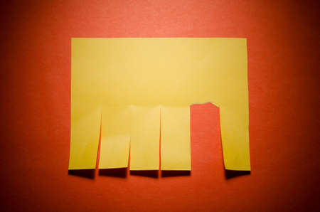 Tear off paper notice on the wallの写真素材