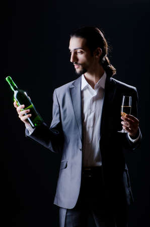 Man tasting wine in glassの写真素材