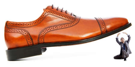 Woman domination concept with shoes and manの写真素材