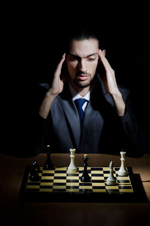 Chess player playing his gameの写真素材