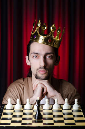 Chess player playing his gameの写真素材