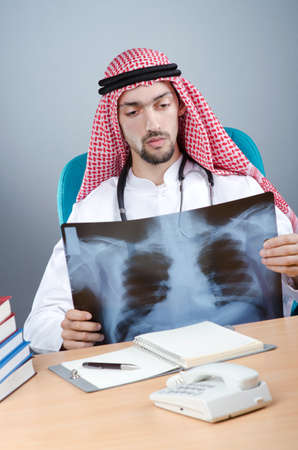 Arab doctor with x-ray printの写真素材