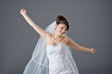 Bride in wedding dress in studio shootingの写真素材