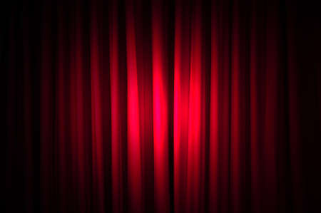 Brightly lit curtains in theatre conceptの写真素材