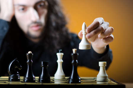 Chess player playing his gameの写真素材