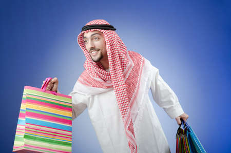 Arab with the gift bagsの写真素材