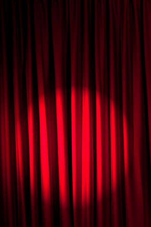 Brightly lit curtains in theatre conceptの写真素材
