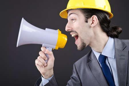 Man shouting and yelling with loudspeakerの写真素材