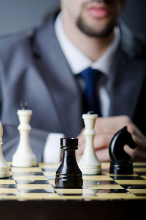 Chess player playing his gameの写真素材