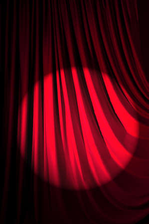 Brightly lit curtains in theatre conceptの写真素材