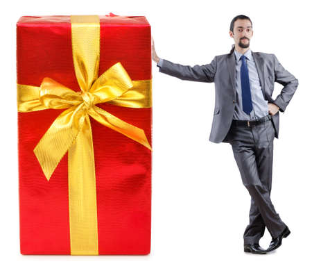 Businessman with gift boxes on whiteの写真素材