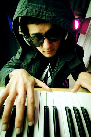 DJ mixing music at disco