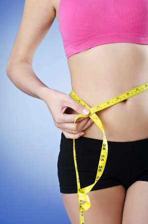 Young lady in dieting conceptの写真素材