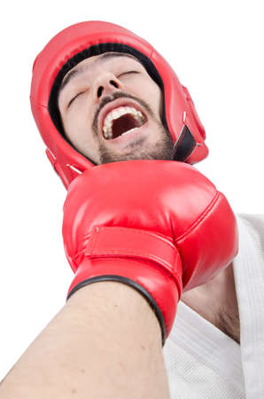 Karate fighter isolated on the whiteの写真素材