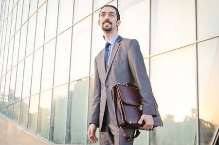 Young businessman on the streetの写真素材