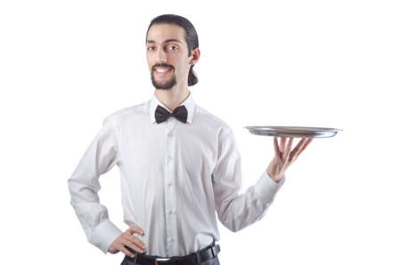 Young waiter with silver trayの写真素材