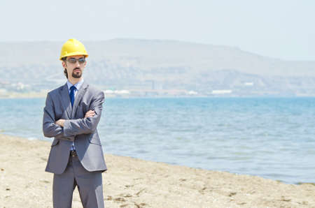 Oil engineer on sea side beachの写真素材