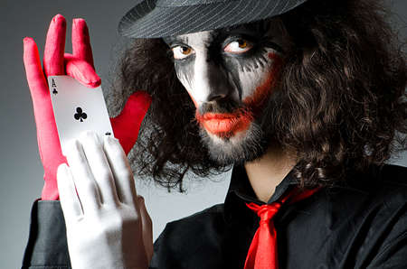 Joker with cards in studio shoot