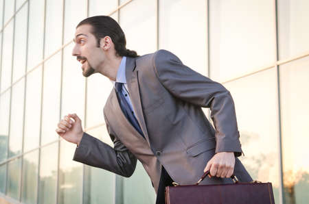 Young businessman on the streetの写真素材