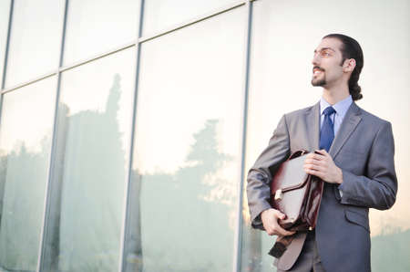Young businessman on the streetの写真素材