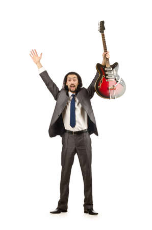 Businessman playing the guitar on whiteの写真素材