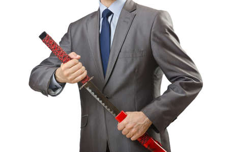 Businessman with sword on white